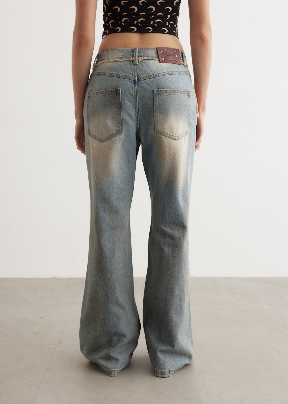 Deconstructed Dirty Wash Bootcut Jeans